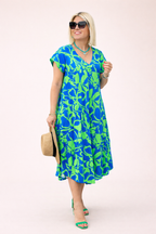 Robe midi florale ample manches courtes poches latérales - Millan