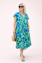 Robe midi florale ample manches courtes poches latérales - Millan