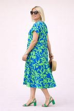 Robe midi florale ample manches courtes poches latérales - Millan