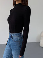 Haut femme col montant manches longues détail corset ajusté - Annelie